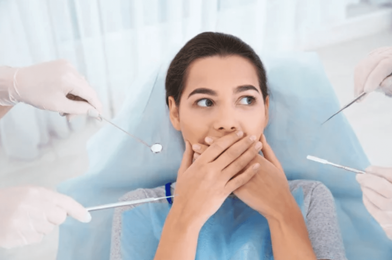 scared woman in dental chair afraid of the dentist Boulder Colorado